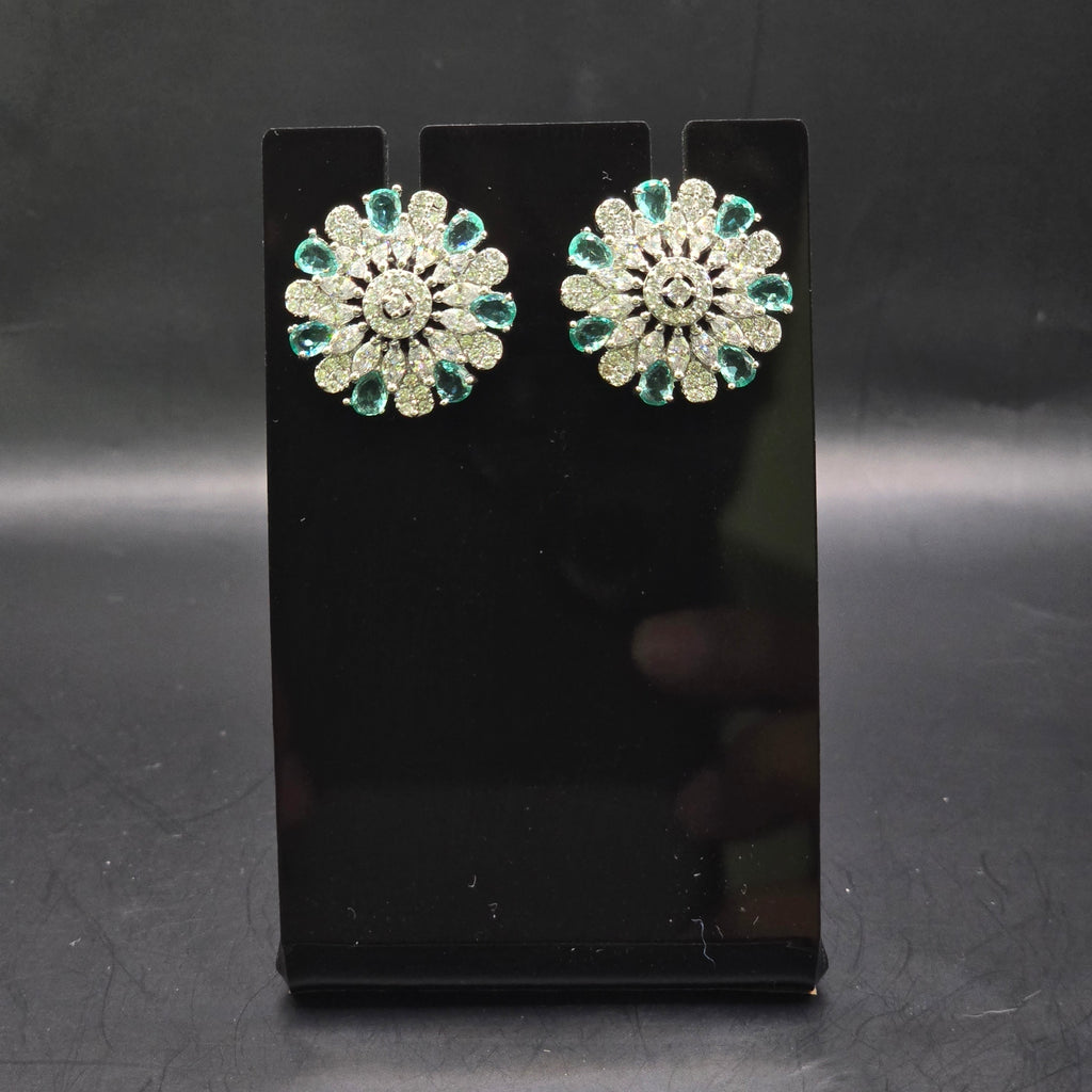 Silver Rhodium Mint Green CZ Sunburst Stud Earrings – Luxury Round Sunflower Tops | أقراط زركون دائرية خضراء