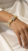 Celestial Duo-Tone Emerald-Cut Starburst Bracelet | سوار النجوم بقطع الزمرد ولونين الفضي والذهبي