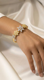 Celestial Duo-Tone Emerald-Cut Starburst Bracelet | سوار النجوم بقطع الزمرد ولونين الفضي والذهبي