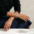 Floral Halo Emerald-Cut Silver Bracelet | سوار فضي بزهور وهالة بقطع الزمرد