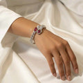 Silver Radiance Ruby-Stone Starburst Bracelet | سوار النجوم الفضي بأحجار الياقوت المتلألئة