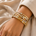 Manruya Anti-Tarnish Gold Crystal Cuff Bracelet | سوار مانرويا الذهبي المفتوح بالكريستال المقاوم لتغير اللون