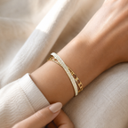 Manruya Anti-Tarnish Gold Crystal Twist Bracelet | سوار مانرويا الذهبي المتقاطع بالكريستال المقاوم لتغير اللون