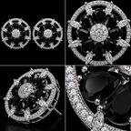 Midnight Black Onyx CZ Floral Wheel Stud Earrings – Luxury Round Statement Tops | أقراط زركون سوداء