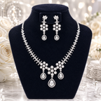 Manruya Luxury CZ Floral Necklace & Earrings Set | طقم عقد وأقراط مانرويا الفاخر بالزركون الفضي بتصميم زهري