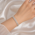 The Eternal Grace Triple-Row Pearl & Rhombus Bracelet | سوار "إيتيرنال غريس" بثلاثة صفوف من اللؤلؤ والمعين