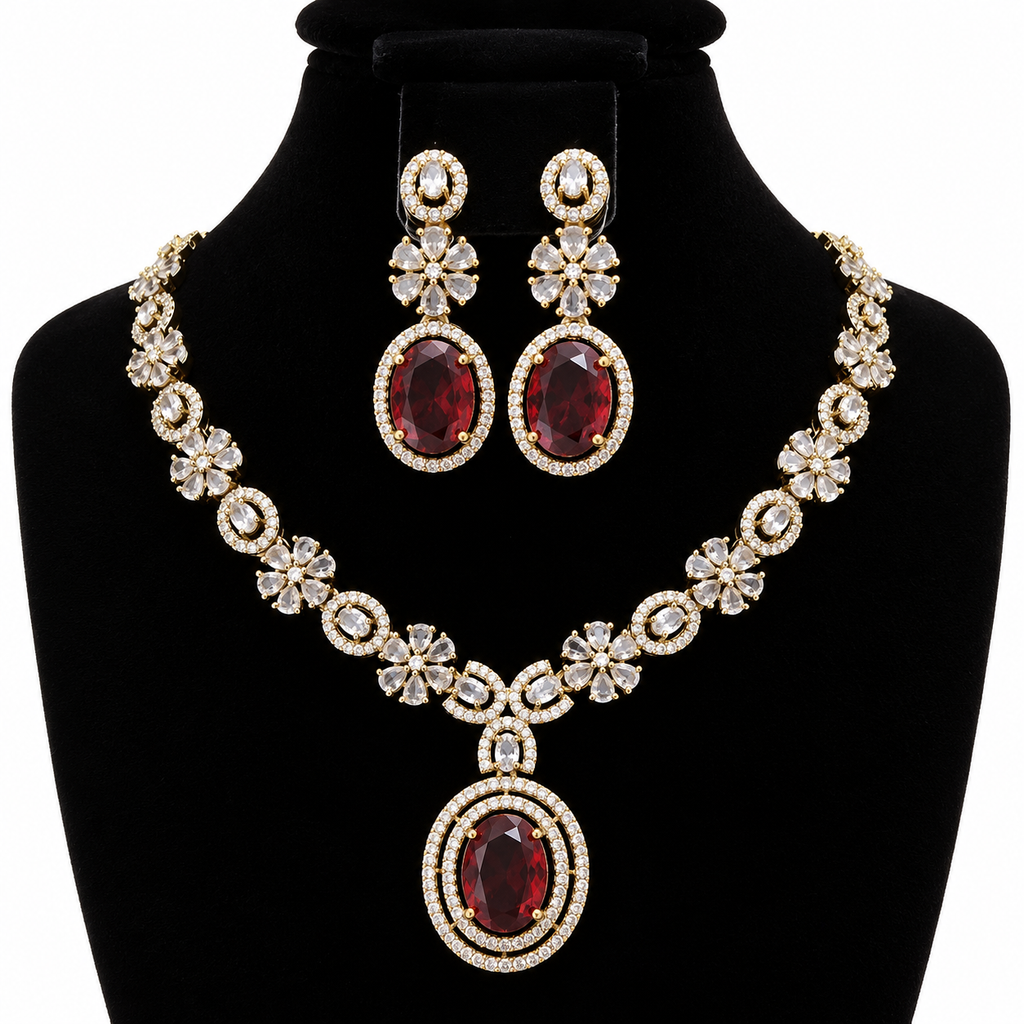 Ruby Red Crystal Necklace & Earrings Set – Gold-Tone Floral Design | طقم عقد وأقراط كريستالي أحمر ياقوتي بتصميم زهري ولون ذهبي