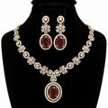Ruby Red Crystal Necklace & Earrings Set – Gold-Tone Floral Design | طقم عقد وأقراط كريستالي أحمر ياقوتي بتصميم زهري ولون ذهبي
