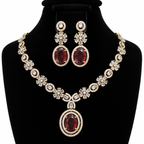Ruby Red Crystal Necklace & Earrings Set – Gold-Tone Floral Design | طقم عقد وأقراط كريستالي أحمر ياقوتي بتصميم زهري ولون ذهبي