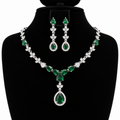 Emerald Green Crystal Necklace & Earrings Set – Silver-Tone | طقم عقد وأقراط بأحجار خضراء زمردية – لون فضي