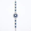 Blue Floral Silver-Tone Bracelet | سوار فضي بتصميم زهري وأحجار زرقاء