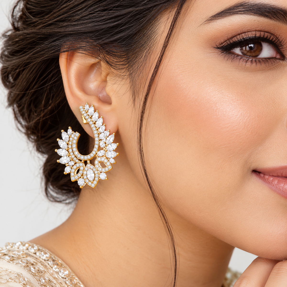 Gold-Tone Leaf Design Crystal Statement Earrings | أقراط بارزة بتصميم أوراق وأحجار كريستالية بلون ذهبي