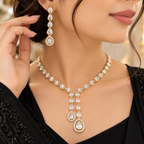 Gold-Tone Teardrop Crystal Necklace & Earrings Set | طقم عقد وأقراط كريستالي بتصميم الدمعة ولون ذهبي