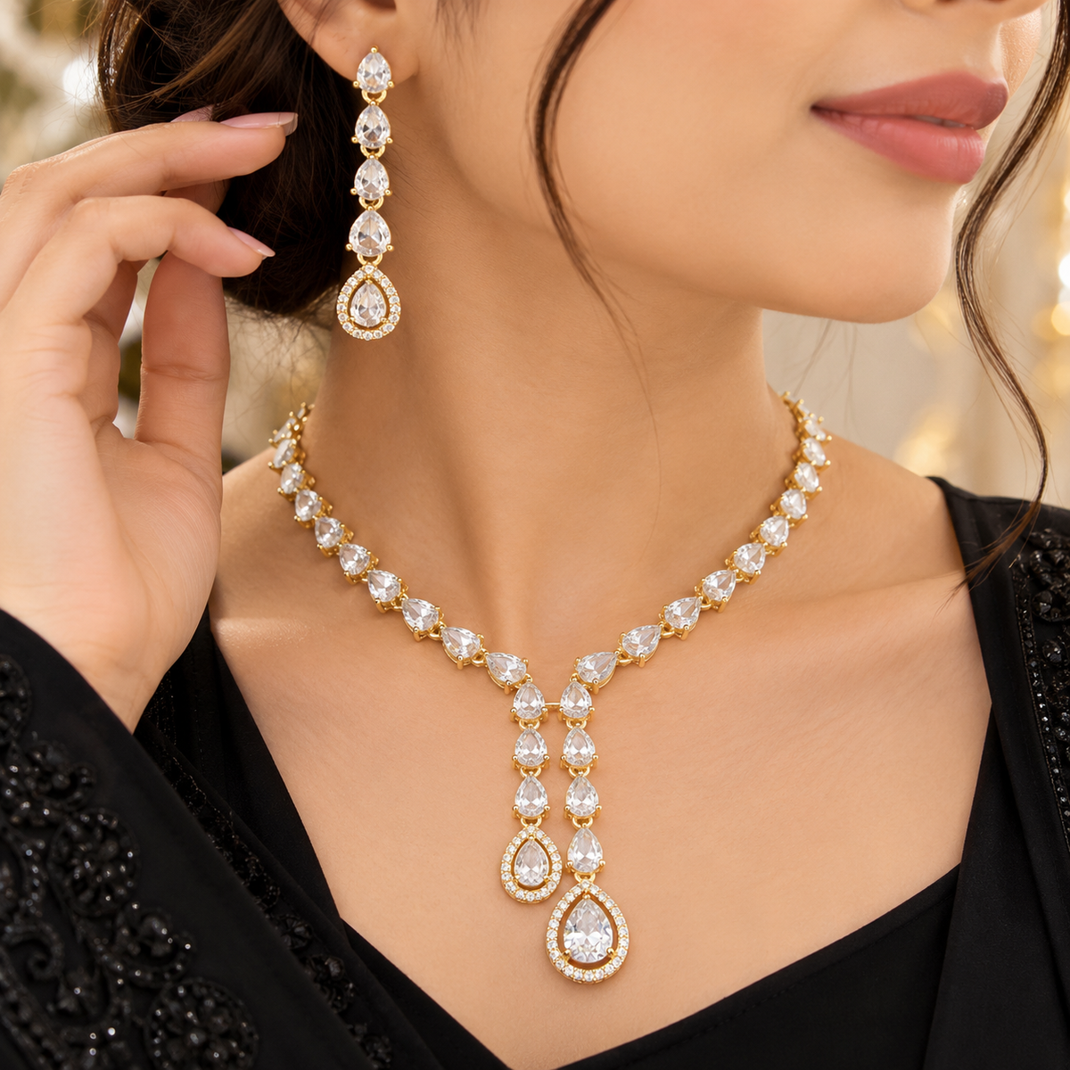 Gold-Tone Teardrop Crystal Necklace & Earrings Set | طقم عقد وأقراط كريستالي بتصميم الدمعة ولون ذهبي