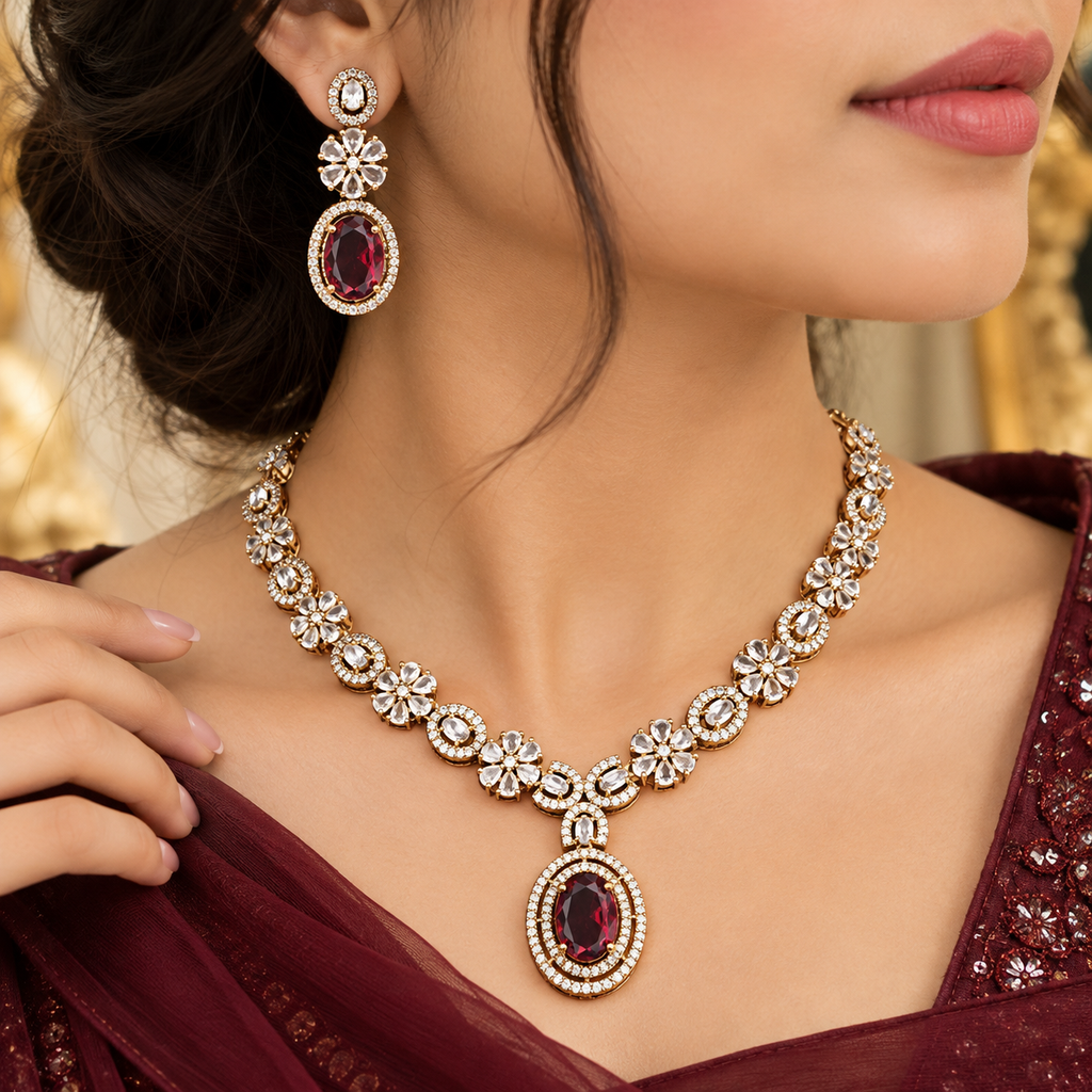 Ruby Red Crystal Necklace & Earrings Set – Gold-Tone Floral Design | طقم عقد وأقراط كريستالي أحمر ياقوتي بتصميم زهري ولون ذهبي