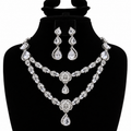 Silver-Tone Crystal Double-Layer Necklace & Chandelier Earrings Set | طقم عقد بطبقتين وأقراط متدلية بالكريستال واللون الفضي