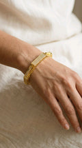 Golden Celestial Starburst CZ Bracelet | سوار النجوم الذهبي المرصع بالزركون